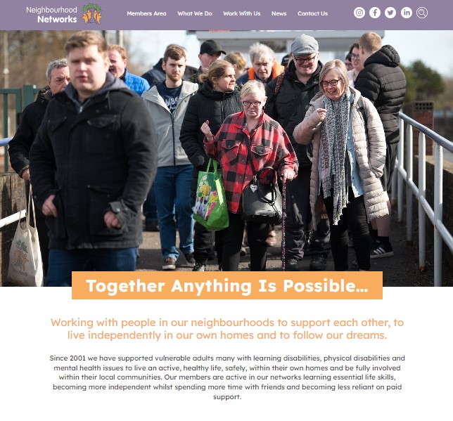 A snapshot of the homepage of the website showing a group of Network Members at a train station