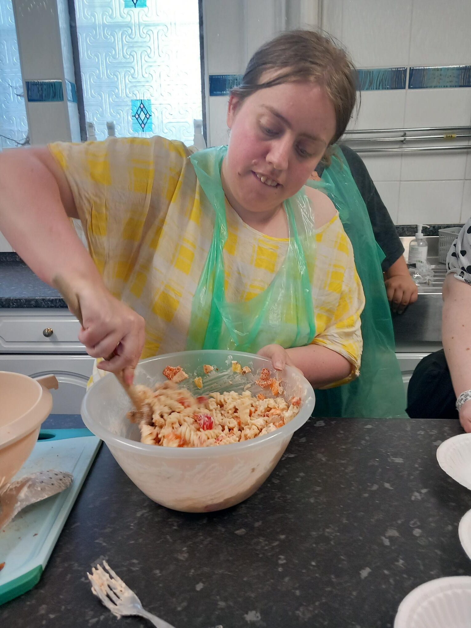 Members preparing food at life skills class