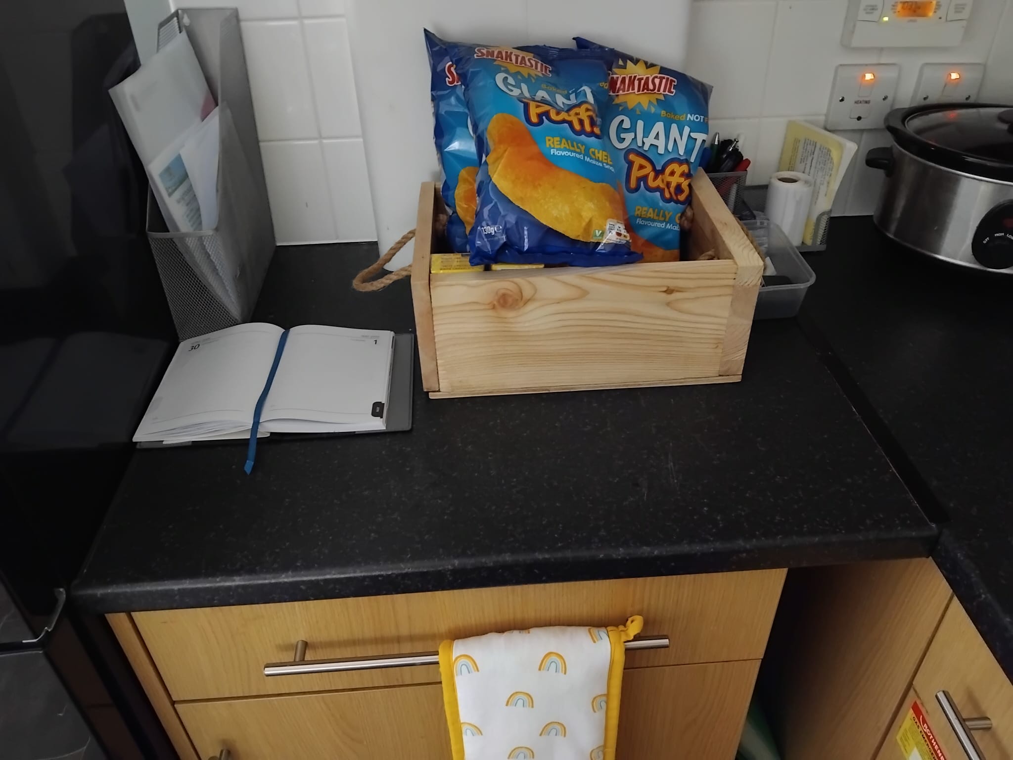 Member display a wooden crate that they made